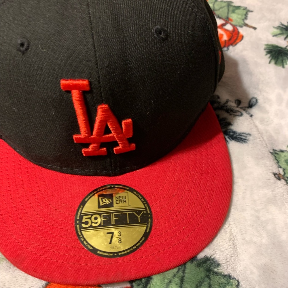 LA red and black hat